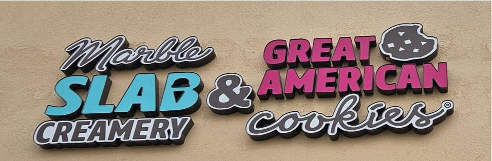 Store sign for Marble Slab Creamery and Great American Cookies.